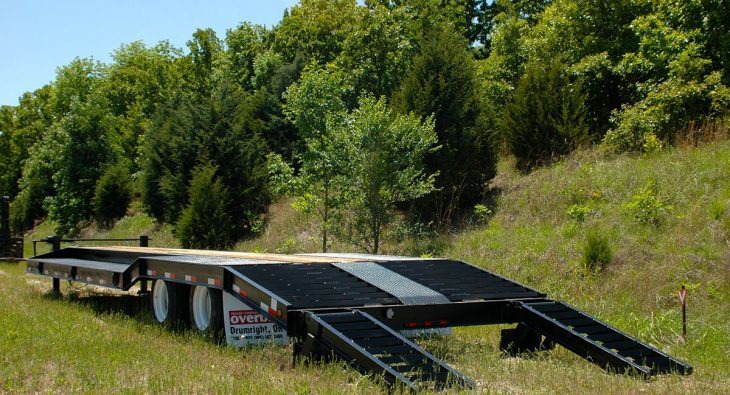 Trailer with ramps in grass