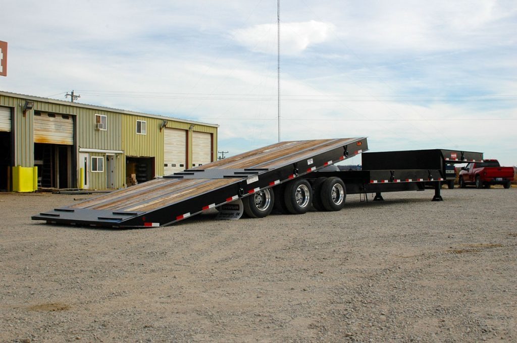 Tilt trailer in front of shop