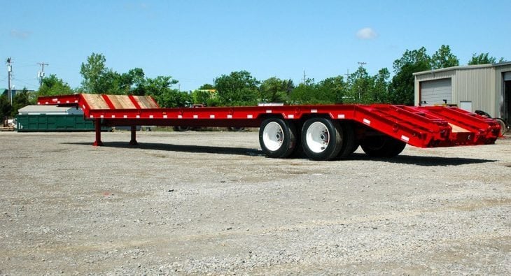 Red lowboy trailer