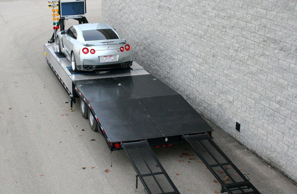 Trailer with a car on it
